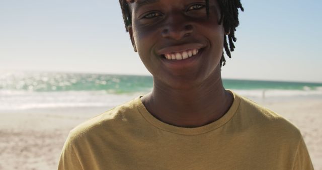 Smiling Person Enjoying Sunny Day at Beach - Download Free Stock Images Pikwizard.com