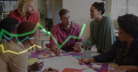 Team discussing business strategy in modern creative office