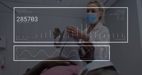 Clinician examining patient knee with augmented reality hud during orthopedic exam