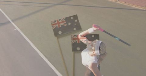 Australian tennis player practicing serve on outdoor court