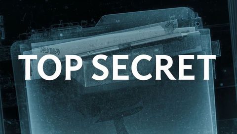 X-ray file folder marked top secret revealing classified documents on cyan radiograph