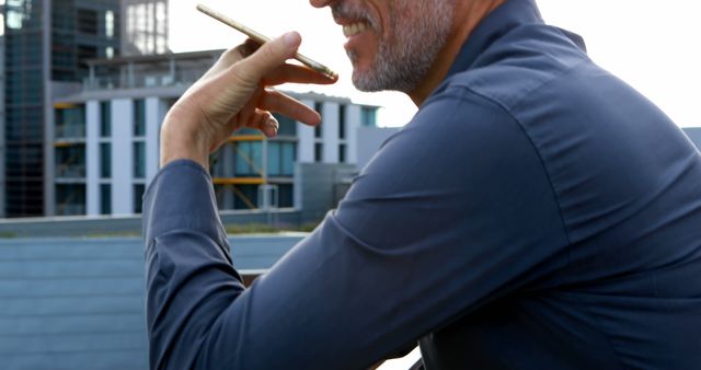 Confident Businessman Talking on Phone Outdoors in City - Download Free Stock Images Pikwizard.com