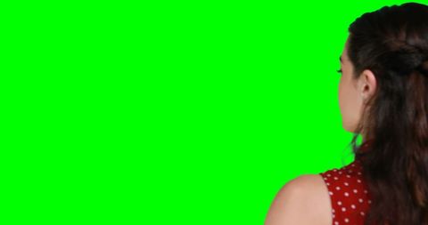 Woman Interacting with Virtual Screen on Green Chroma Background - Download Free Stock Images Pikwizard.com