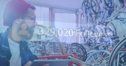 Entrepreneur in Bicycle Shop Gaining Social Media Followers - Download Free Stock Images Pikwizard.com
