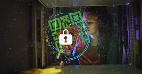 African American Female Technician Securing Server Room Network