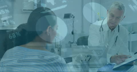 Doctor Discussing Medical Data with Woman in High-Tech Setting