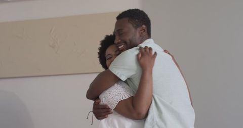 Joyful African American Friends Sharing a Warm Embrace