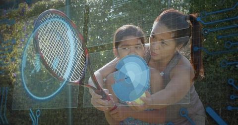 Coach guiding child in tennis with augmented reality hud training overlay