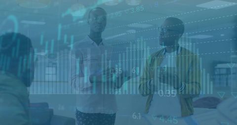 Diverse business team analysing financial data in modern office