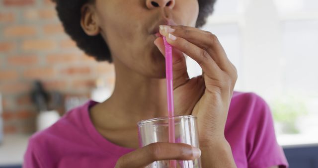 Close-up of Woman Drinking from Straw in Glass - Download Free Stock Images Pikwizard.com