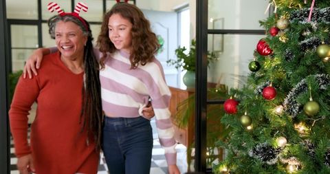 Grandmother and Granddaughter Enjoying New Home Celebration
