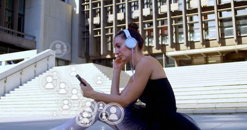 Woman Wearing Black Dress Enjoying Music Outdoors