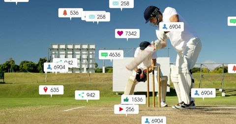 Cricketer Engaging with Social Media Icons on Field