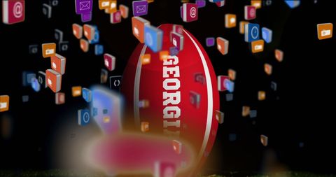 Social Media Icons Hovering Over Rugby Ball
