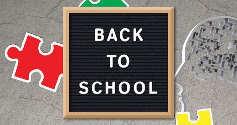 Back to school concept with puzzle and letter board