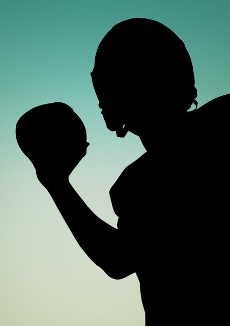 Digital composite image of silhouette athlete holding rugby ball
