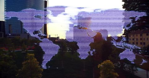 Glitchy Digital World Map Overlaying Urban Park Sunset Skyline with Reflective Skyscrapers