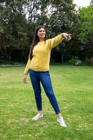Happy Woman in Yellow Sweater Enjoying Green Park