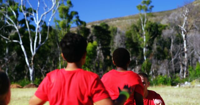 Kids Playing Outdoor Game in Red Shirts on Sunny Day - Download Free Stock Images Pikwizard.com