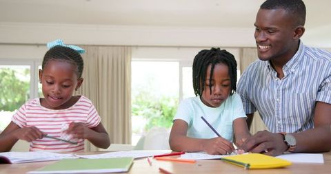 Father Helping Children with Homework, Smiling Family Bonding