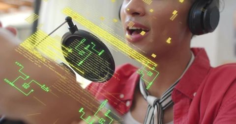 Male recording vocals in home studio with headphones, pop filter and digital code overlay