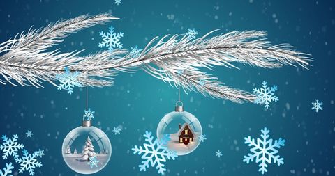 Christmas Baubles on Branch with Falling Snowflakes