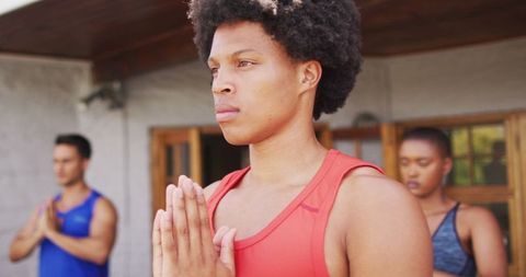Diverse Group Engaged in Outdoor Yoga Practice