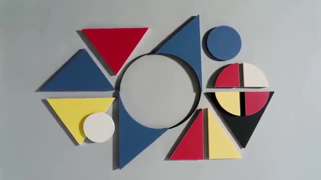 Dynamic Display of Colorful Wooden Geometric Shapes
