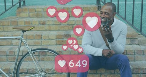 Senior African American Man with Social Media Heart Icons
