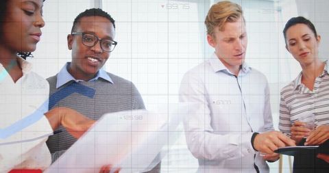 Corporate Team Collaborating on Business Reports and Data Analysis