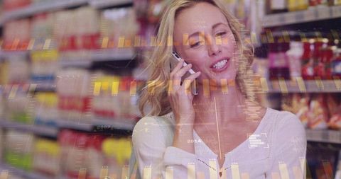 Young woman talking on smartphone while shopping with retail data analytics overlay