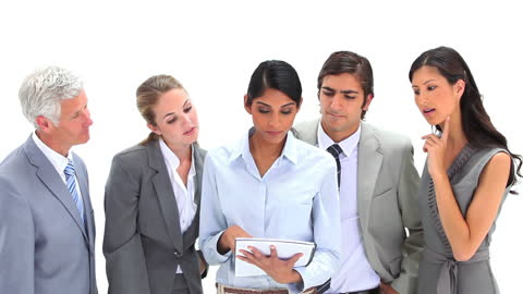 Diverse Business Team Collaborating on Tablet