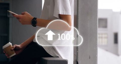 Student Uploading to Cloud While Relaxing with Coffee