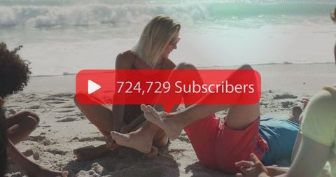 Friends Relaxing on Beach Highlighting Social Media Engagement