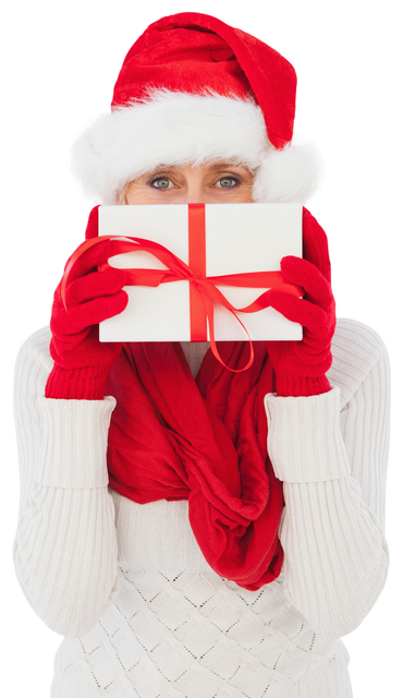 Senior Woman With Christmas Hat Holding Present And Isolated On Transparent Background - Download Free Stock Videos Pikwizard.com