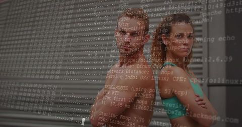 Standing back-to-back fitness duo crossing arms with digital code overlay showing strength