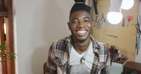 Smiling African American Craftsman in Leather Workshop - Download Free Stock Images Pikwizard.com
