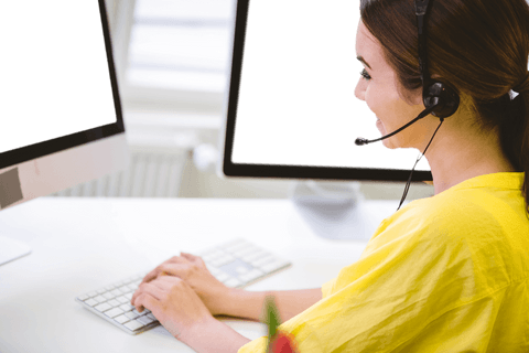 smiling woman using headset and computer with transparent screens - Download Free Stock Videos Pikwizard.com