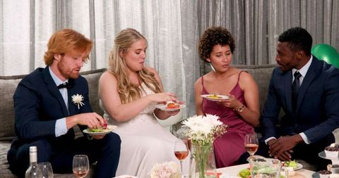 Friends Celebrating at Wedding Reception Indoor Gathering