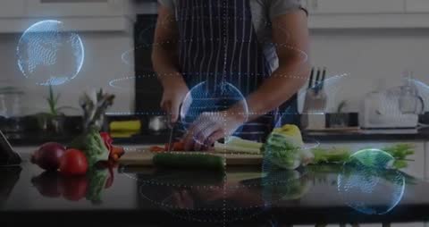 Home chef chopping vegetables while holographic data orbs orbit modern kitchen workspace