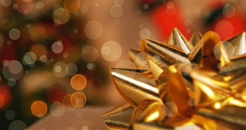 Golden Christmas Gift Ribbon with Festive Bokeh Lights - Download Free Stock Images Pikwizard.com