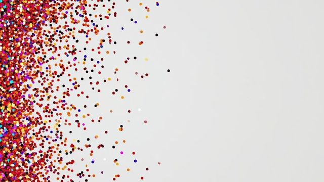 Vibrant Multicolored Confetti Scattering on White Background