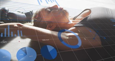Reclining fit woman resting on workout bench with augmented fitness data and analytics