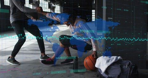 Training duo dribbling basketball in industrial gym, data analytics overlay and teamwork