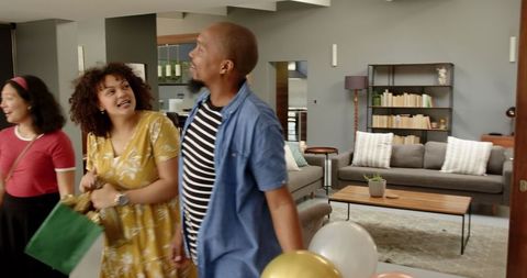 Diverse Friends Celebrating at Home Gathering