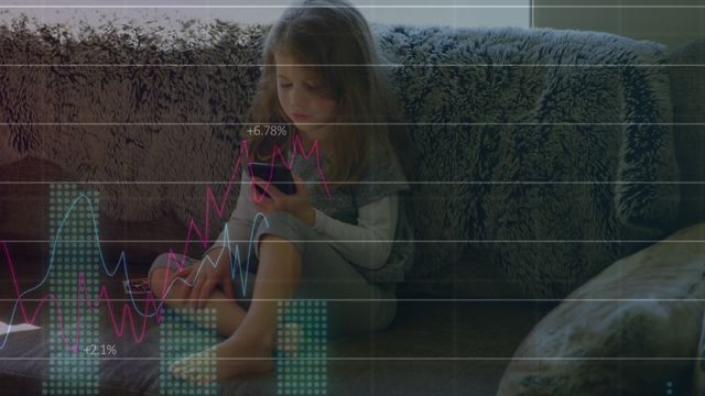 Young girl sitting on a sofa intensely using a smartphone, with overlay of financial graphs and data projections. This can be used in articles or presentations related to the impact of technology on children, digital literacy, modern childhood, and how early exposure to data and smartphones might shape future generations.