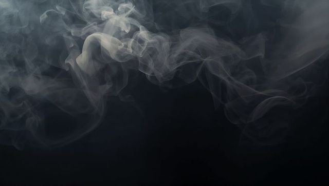Intricate Smoke Plumes Against Dark Background