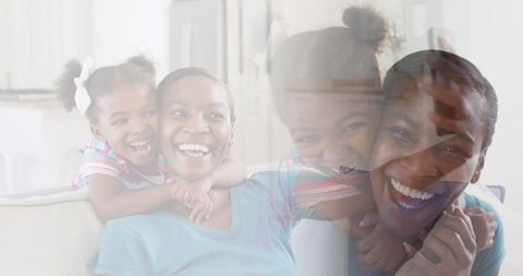 Joyful Mother and Daughter Sharing Happy Moments on Couch - Download Free Stock Images Pikwizard.com