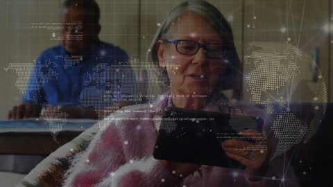 Senior Woman Using Tablet with Digital Data Overlay Technology Concept