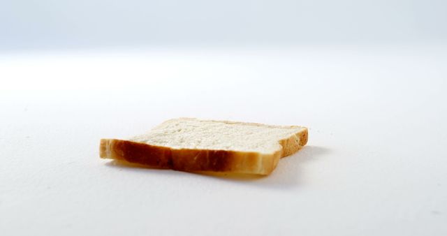 Single Slice of White Bread on Light Background - Download Free Stock Images Pikwizard.com